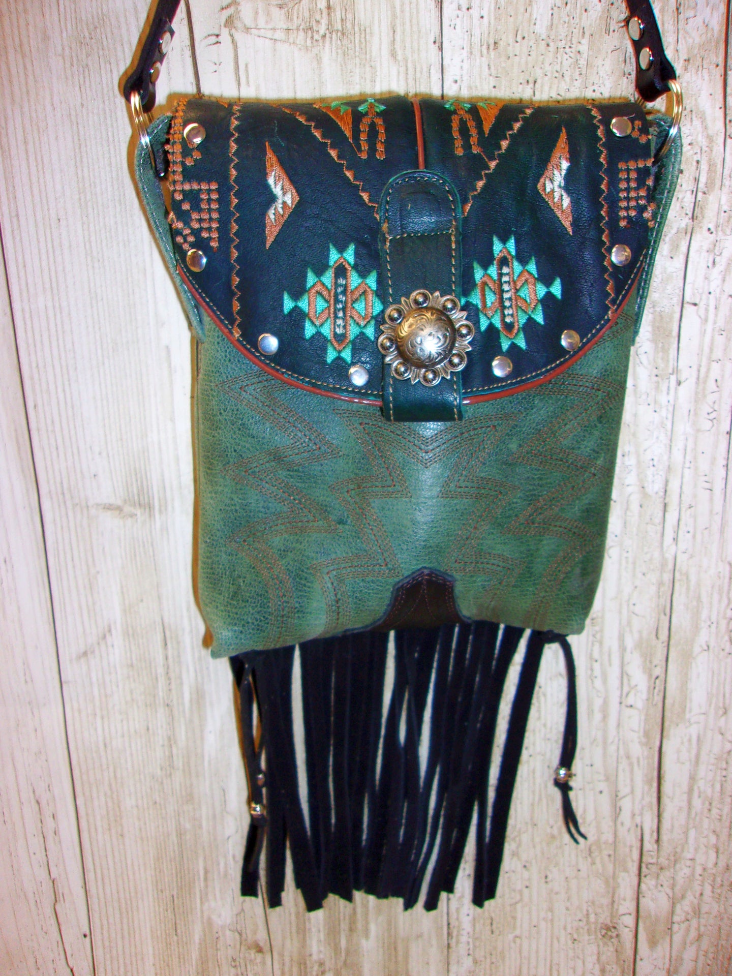 Small Cowboy Boot Purse with Fringe sm220 handcrafted from cowboy boots. Shop all unique leather western handbags, purses and totes at Chris Thompson Bags